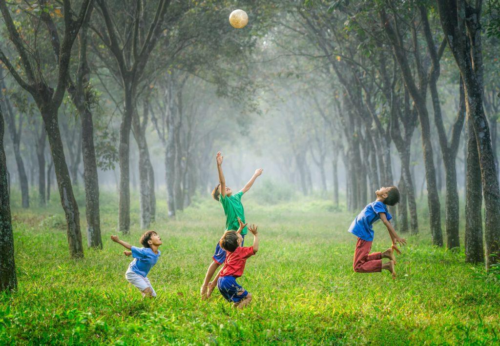 Photo of children playing. Childhood is usually the phase when we have the most health and energy. Investing in staying healthy is key to regaining the joy we had as children
