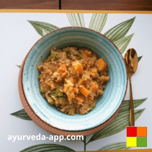 photo of Mung beans stew with pumpkin and rice on a blue plate with brown border. Next to the plate is a golden spoon