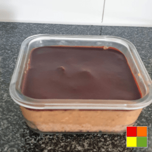 Picture of Peanut Butter Date Squares in a glass baking dish before serving